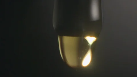 Oil drop slowmotion close up studio Видео 91353565