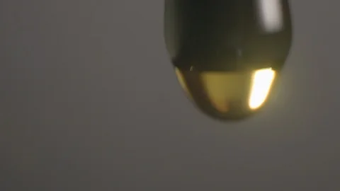 Oil drop slowmotion close up studio Stock-Footage 91353681