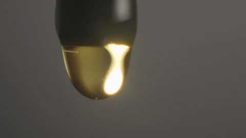 Oil drop slowmotion close up studio Stock Footage 91353700