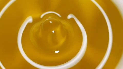 Oil drops and ripple, slow motion. Stock Footage