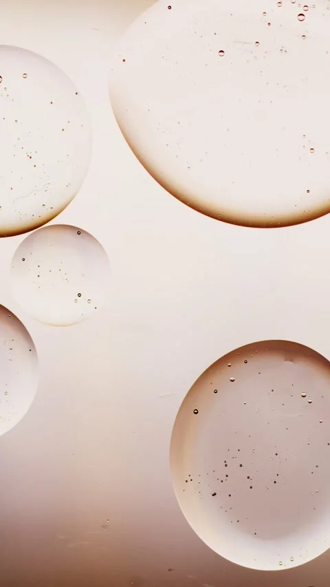 Oil drops connect on white background Vídeo Stock 237704571