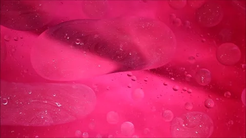 Oil drops on a water surface abstract background Video stock 158857692
