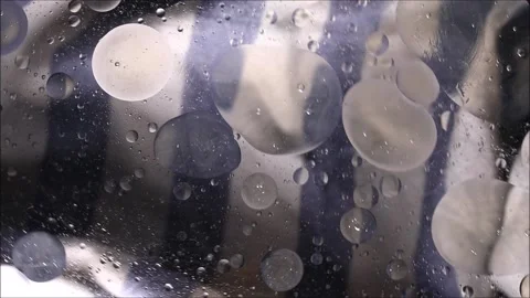Oil drops on a water surface abstract background Stock Footage 158857798
