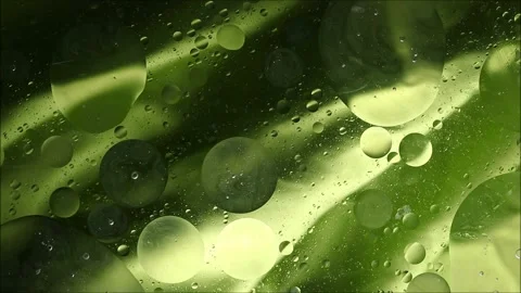 Oil drops on a water surface abstract background Stock Footage 159496112