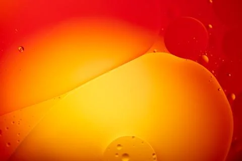 Oil drops on a water surface abstract background Stock Photos