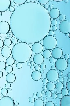 Oil drops on a water surface Stock Illustration