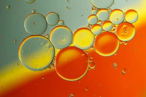 Oil drops on a water surface Stock Photos