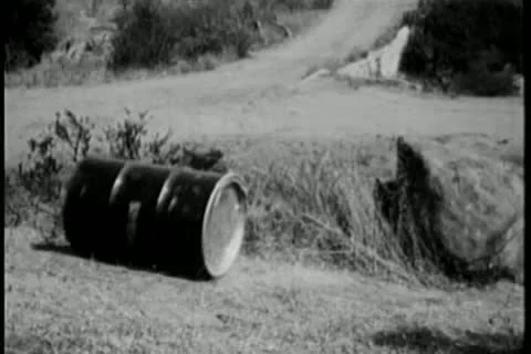 Oil drum rolling down hill 스톡 동영상 14522477