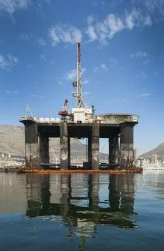 An oil extraction platform in Table Bay harbour, Cape Town. Stock Photos