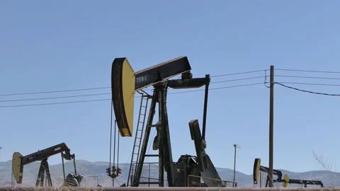 Oil Fields and power lines For Editorial Use Only Stock Footage 147459266