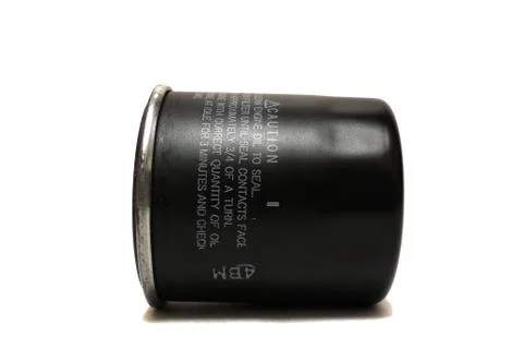 The oil filter on a white background Stock Photos