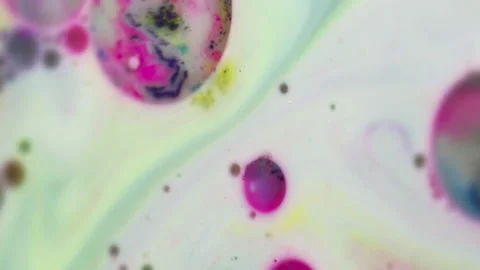 Oil fluid paint texture pink green ink splatter Stock Footage 280927080