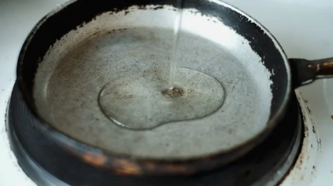 The oil in a frying pan Stock Footage 64164473