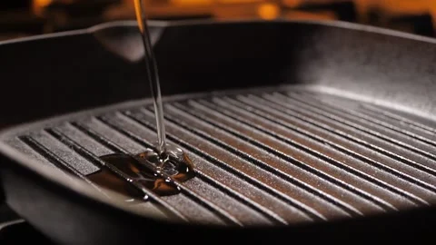 Oil on a frying pan Stock Footage 143976271