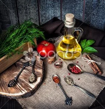 Oil with herbs and spices Stock Photos
