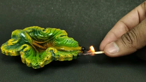 Oil lamp lit by hand using matchstick Stock Footage 141425098