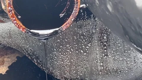 Oil Leaking From a Pipe Stock Footage 242101181