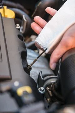 Oil level check in a car engine Stock Photos
