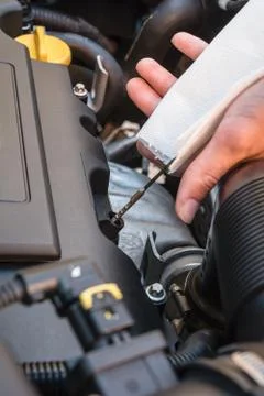 Oil level check in a car engine Stock Photos