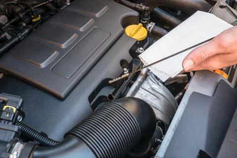 Oil level check in a car engine Stock Photos