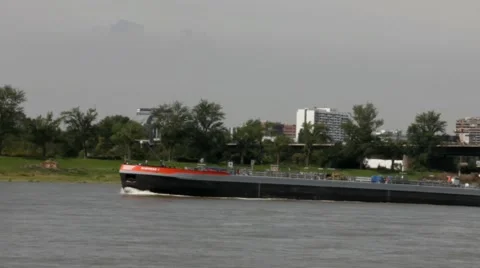 Oil loading barge-tanker sails on river Rhine Stock Footage 40676091