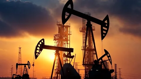 Oil machine oil machine sunset workers oil Stock Footage 293029176