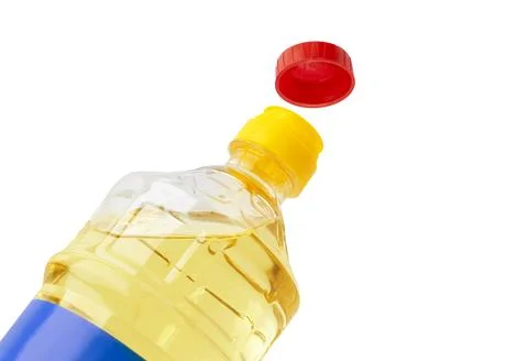 Oil in an opened plastic bottle Stock Photos