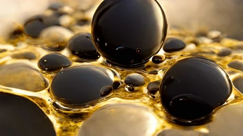 Oil on Orange Background, Animation Loop Stock Footage 210843677