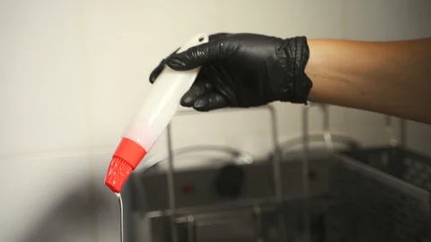 Oil in a pan Stock Footage 129685167