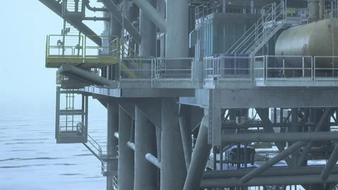 Oil platform built on water during winter with ice on the surface Stock Footage 344109346