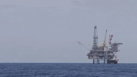 Oil platform in the ocean on daytime Stock Footage 155150487