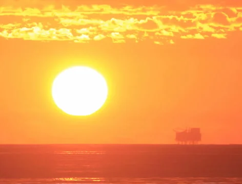 Oil platform at sunset - 01b 2k Stock Footage 5687933