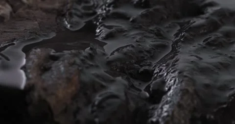 Oil Pools on Stony Ground. Stock Footage 273571931