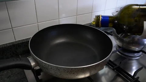 Oil in a pot Stock Footage 126990410