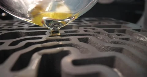 Oil is pour onto car part for testing closeup Stock Footage 171067260