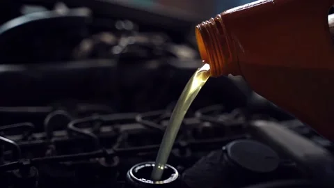 Oil is poured into the engine Video stock 153281726