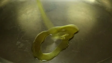 Oil poured into the pan Stock Footage 62245902