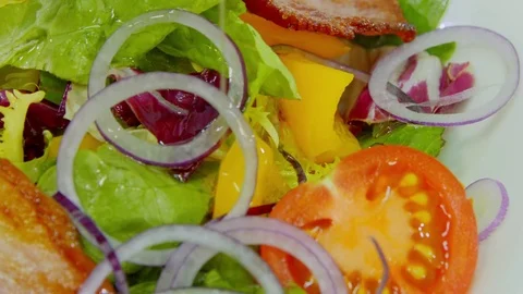 Oil is poured on the salad Stock Footage 70973448
