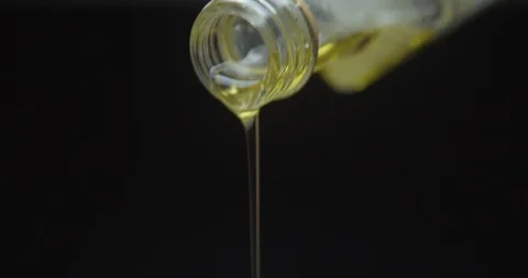 Oil pouring studio close up Stock Footage 91353884
