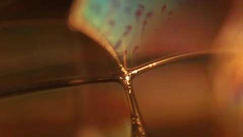 Oil production, bubbles in macro, texture of viscous brown liquid Stock Footage 309944800