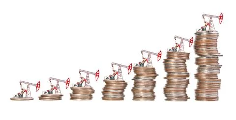 Oil pump and stack of coins isolated on white background. The concept of oil  Foto stock
