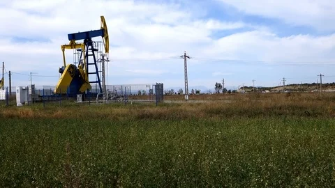 Oil pump on field Stock Footage 102720610