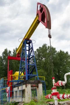 Oil pump in the forest Stock Photos