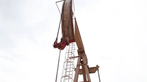 Oil pump going up and down close up shot Stock Footage 65826299