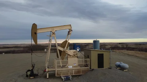 Oil pump jack with drone Stock Footage 169887394