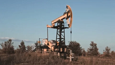 Oil pump jack Stock Footage 83633240