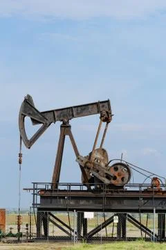 Oil pump jack Stock Photos