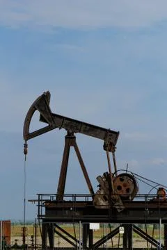 Oil pump jack Stock Photos