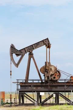 Oil pump jack Stock Photos