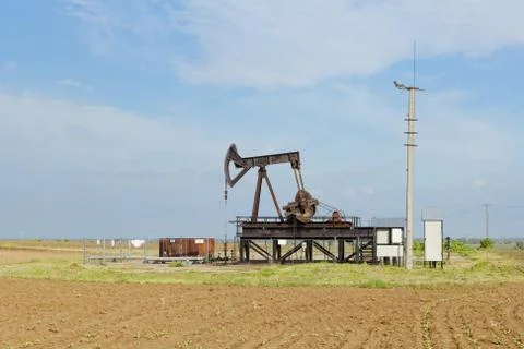 Oil pump jack Stock Photos